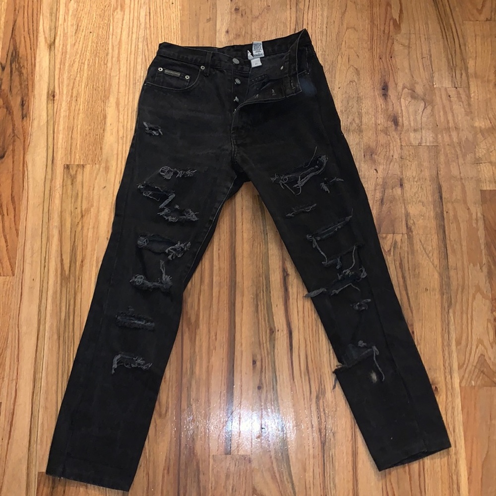 Black distressed Calvin Klein jeans